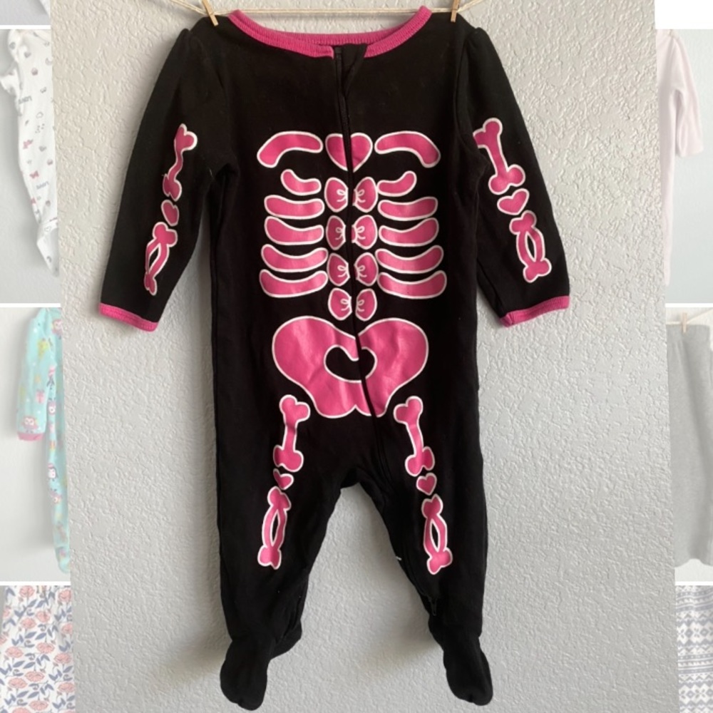Black footed Onesie with pink skeleton bones